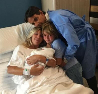 Gaia Lucariello with her newborn and family.